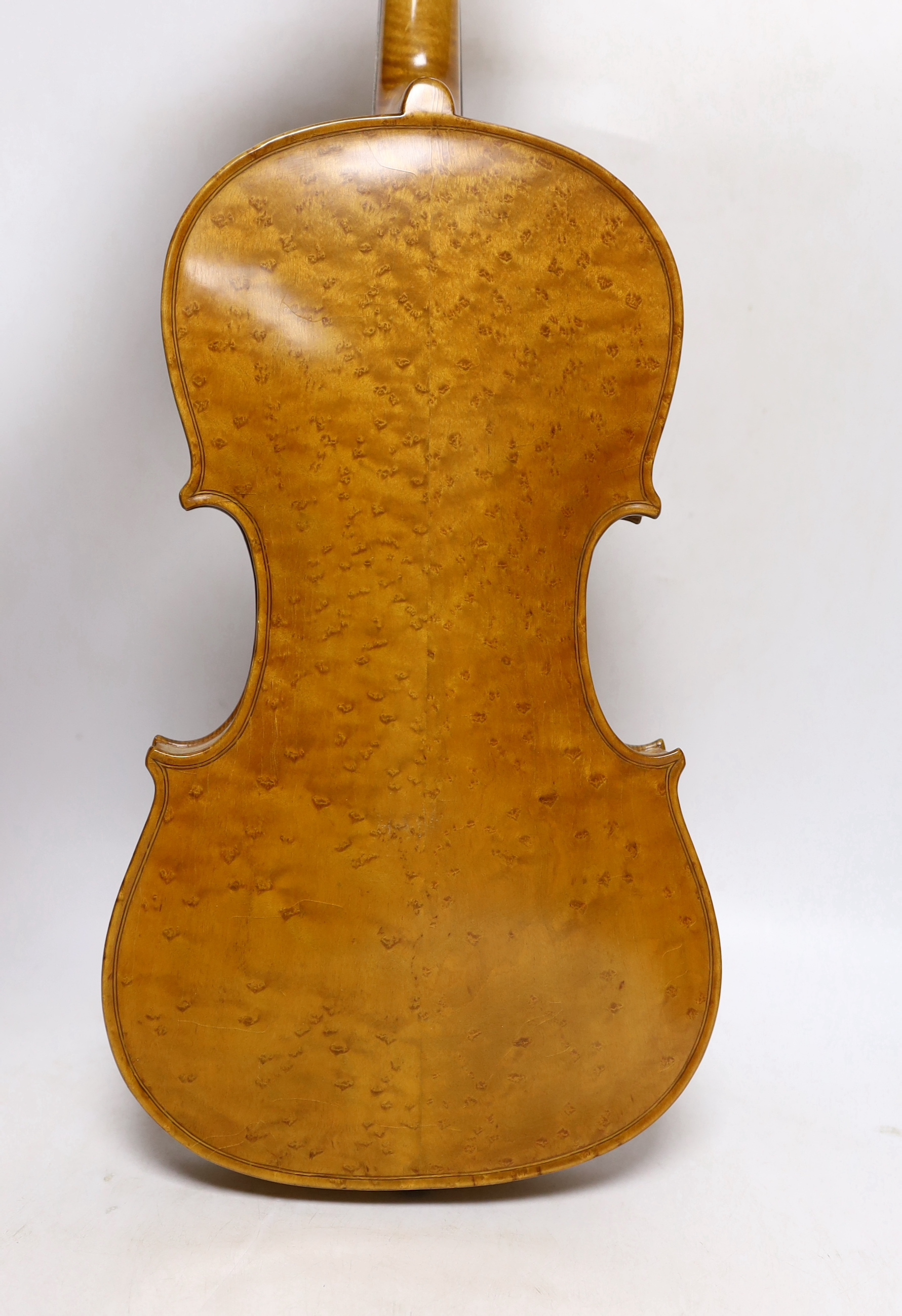 A bird's eye maple veneered student's violin, 58.5cm long